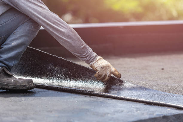Professional Waterproofing technician working in Somerset Center, MI
